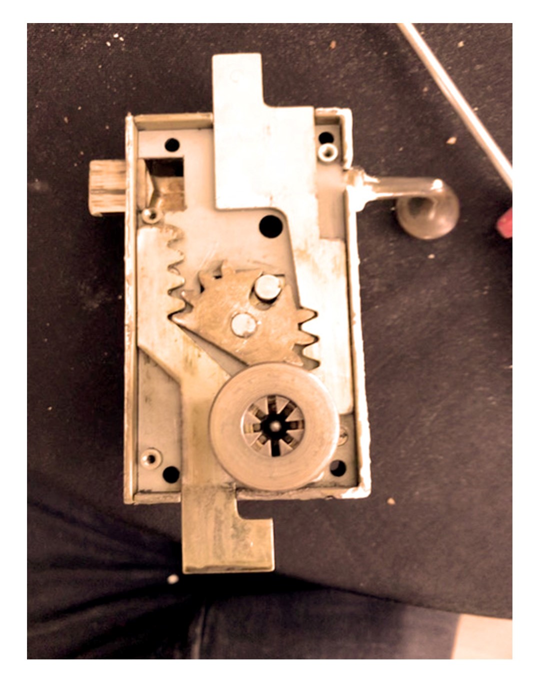 Worker replace aluminium swing door lock.